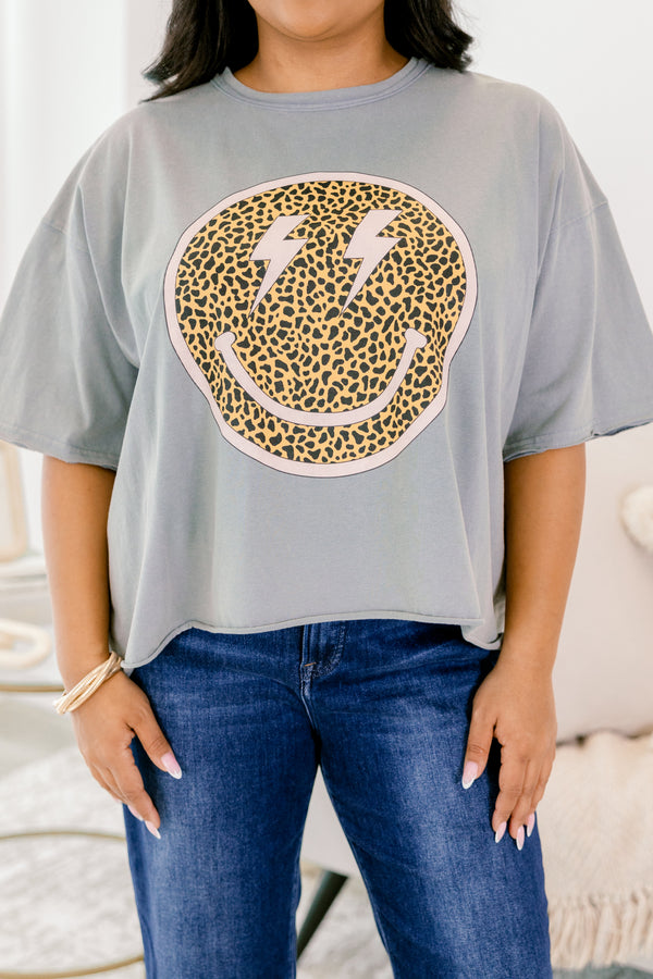 Chic Soul plus size clothing, grey vintage wash short sleeve slightly cropped tee with leopard print smiley face on the front with pink outline and lightning bolts as the eyes