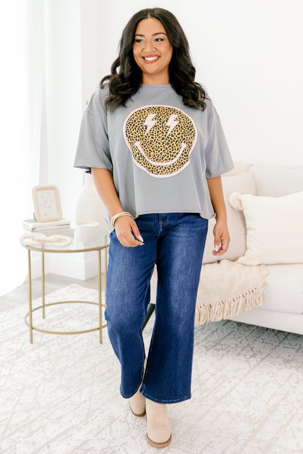 Chic Soul plus size clothing, grey vintage wash short sleeve slightly cropped tee with leopard print smiley face on the front with pink outline and lightning bolts as the eyes