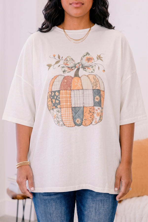 Chic Soul plus size clothing, ivory short sleeve boyfriend tee with patchwork pumpkin in the middle and a bow on the stem