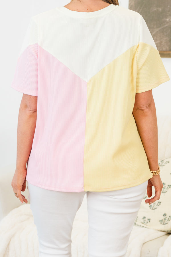 Chic Soul plus size clothing, yellow/pink short sleeve flowy top with round neckline with yellow on one side and pink on the other with white top detail