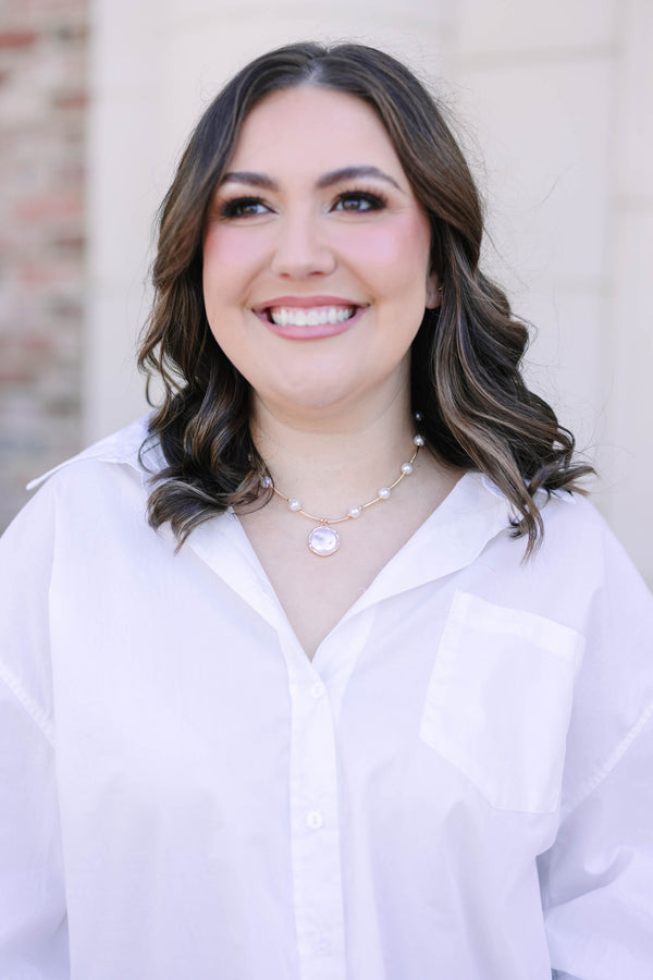 Plus size clothing, pearl and gold necklace