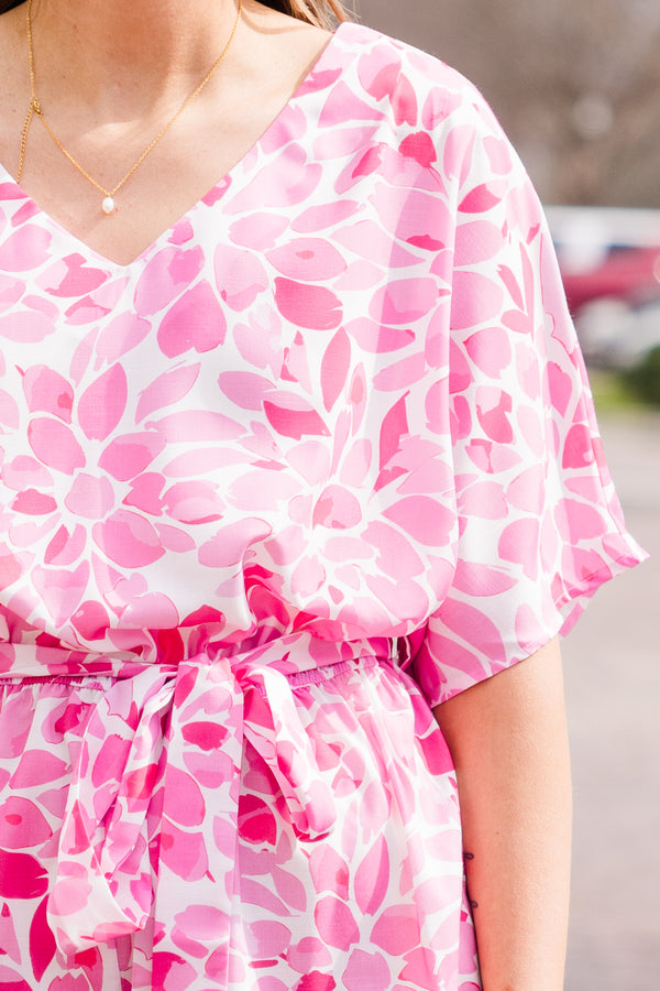 Chic Soul plus size clothing, pink short sleeve romper with floral pattern with v neckline and tie waist detail