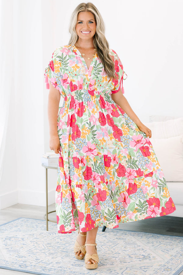Plus Size pink floral maxi dress with a V-neckline, smocked waist, and tiered skirt.