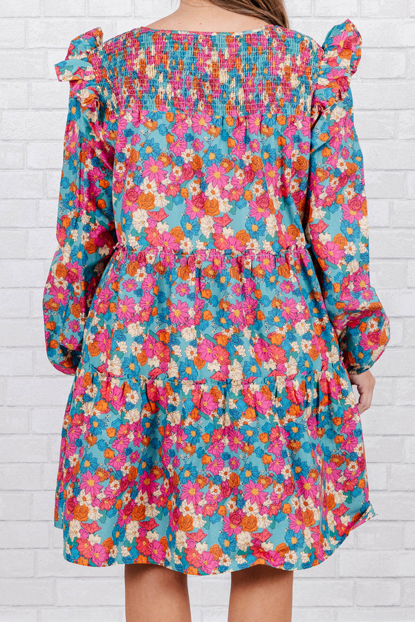 Chic Soul plus size clothing, Puff sleeve knee length dress in mint pink, with pink, blue, and orange floral design with ruching along neck and tie detail