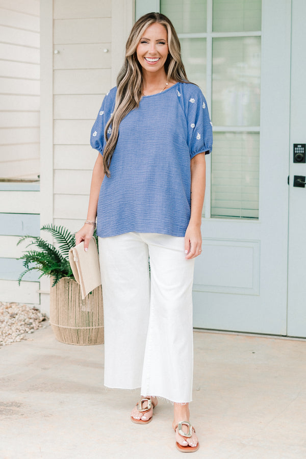 Chic Soul plus size clothing, short sleeve blue top with puff sleeves with white small floral emblems on sleeves