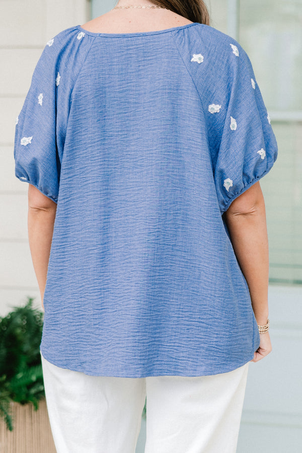 Chic Soul plus size clothing, short sleeve blue top with puff sleeves with white small floral emblems on sleeves