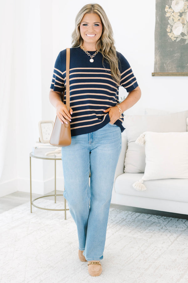 Plus size navy short-sleeve knit sweater with brown horizontal stripes and a ribbed crew neckline.