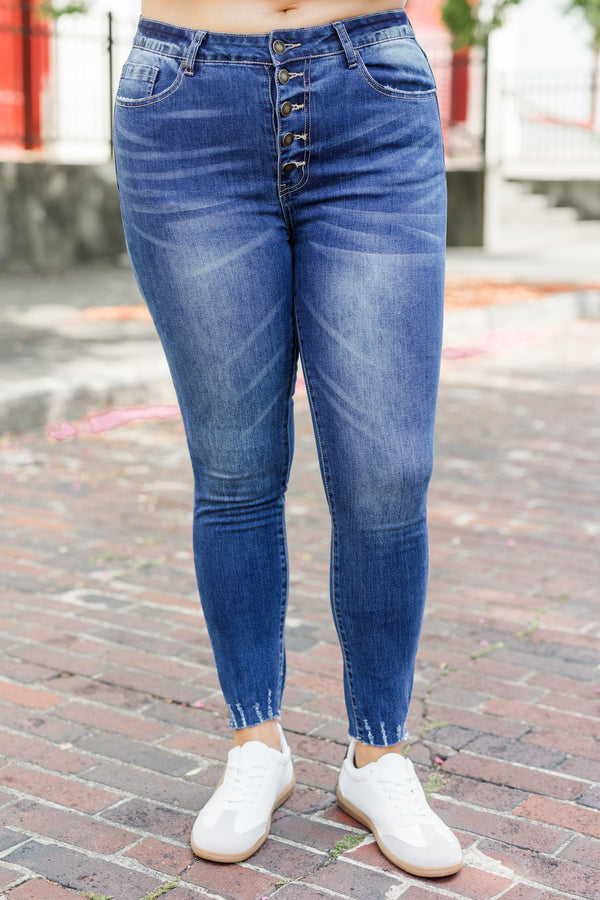 Chic Soul plus size clothing, dark wash skinny jeans with raw hem distressing at the bottom with multi button up clasps
