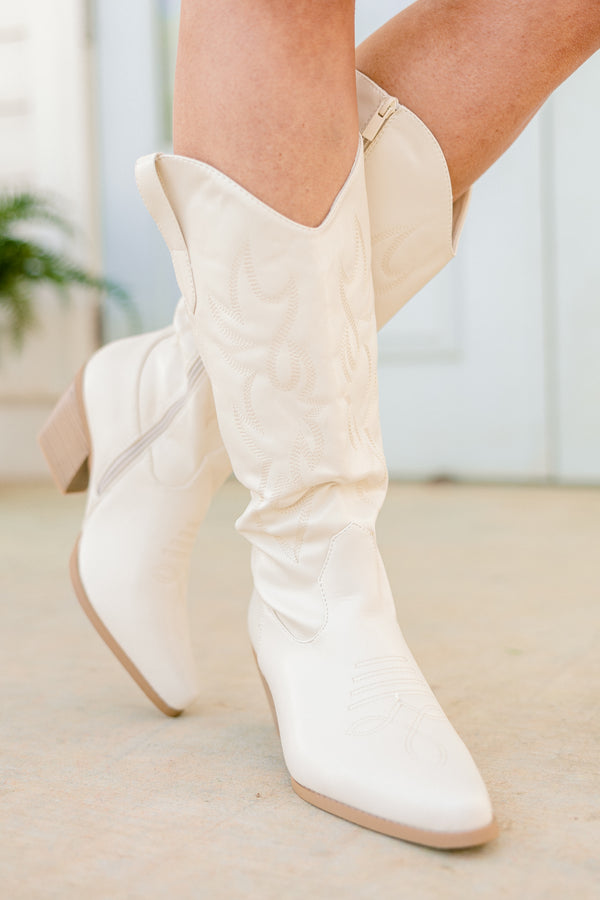 Chic Soul plus size clothing, bone white faux leather cowboy boots with an off-white stitching and a pointed toe with a light brown heel and a zipper on the side 