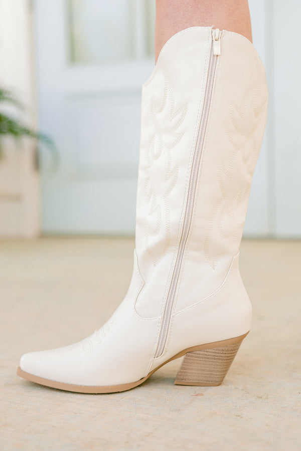 Chic Soul plus size clothing, bone white faux leather cowboy boots with an off-white stitching and a pointed toe with a light brown heel and a zipper on the side 