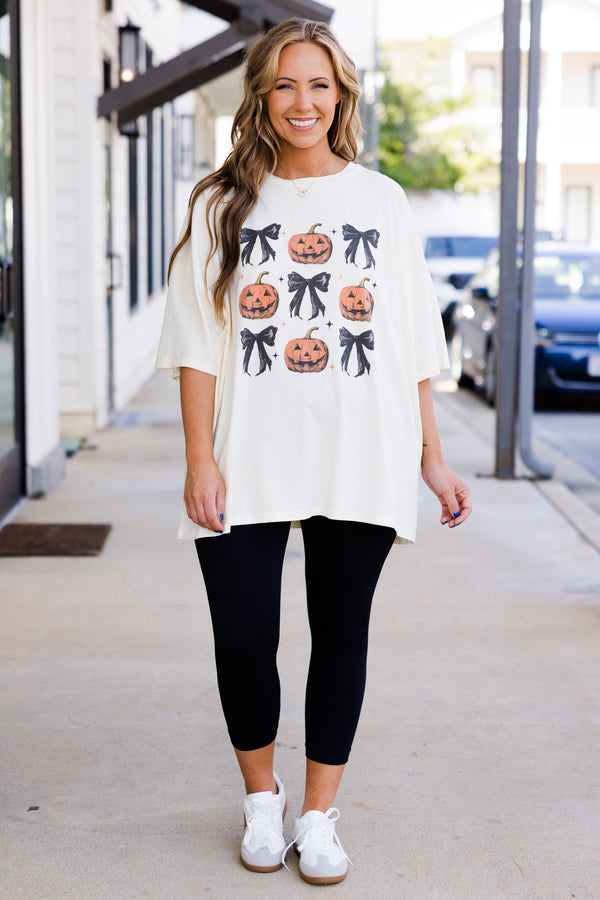 Chic Soul plus size clothing, short-sleeve ivory boyfriend tee with graphic of black bows and carved pumpkins