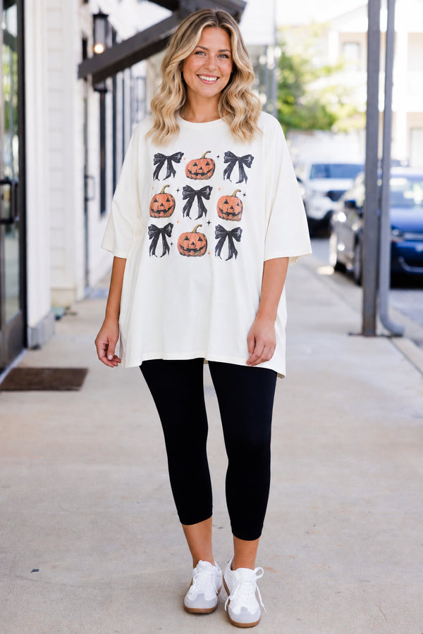 Chic Soul plus size clothing, short-sleeve ivory boyfriend tee with graphic of black bows and carved pumpkins