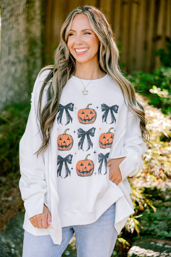 Chic Soul plus size clothing, ivory long sleeve crewneck with orange pumpkins and black bows in a square graphic 