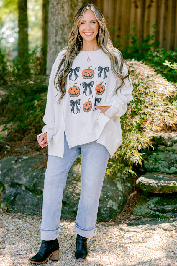 Chic Soul plus size clothing, ivory long sleeve crewneck with orange pumpkins and black bows in a square graphic 