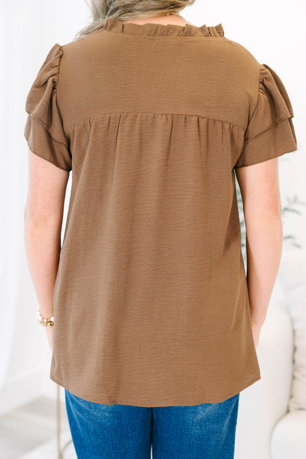 Plus Size brown short-sleeve top with ruffled sleeves, a V-neckline, and a relaxed fit.