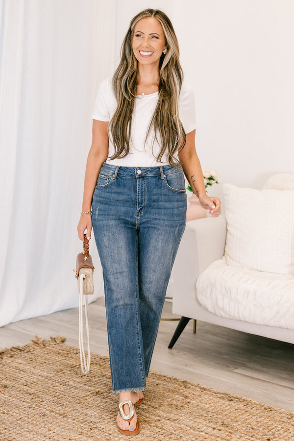 Chic Soul plus size clothing, mid-waisted medium wash denim blue jeans with a cropped straight leg and a distressed hem 