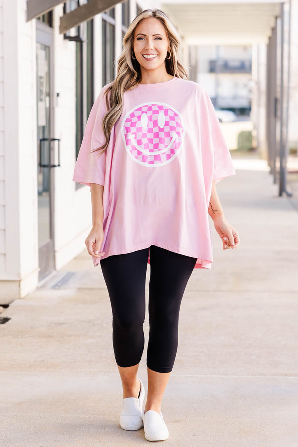 Plus Size dusty pink oversized boyfriend tee with a checkered smiley face graphic and crew neck.