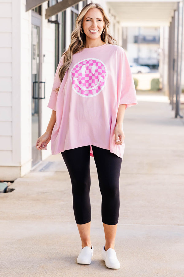 Plus Size dusty pink oversized boyfriend tee with a checkered smiley face graphic and crew neck.