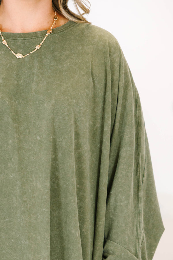 Plus size olive mineral wash tunic with a flowy high-low hem and long sleeves.