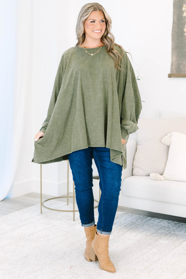 Plus size olive mineral wash tunic with a flowy high-low hem and long sleeves.