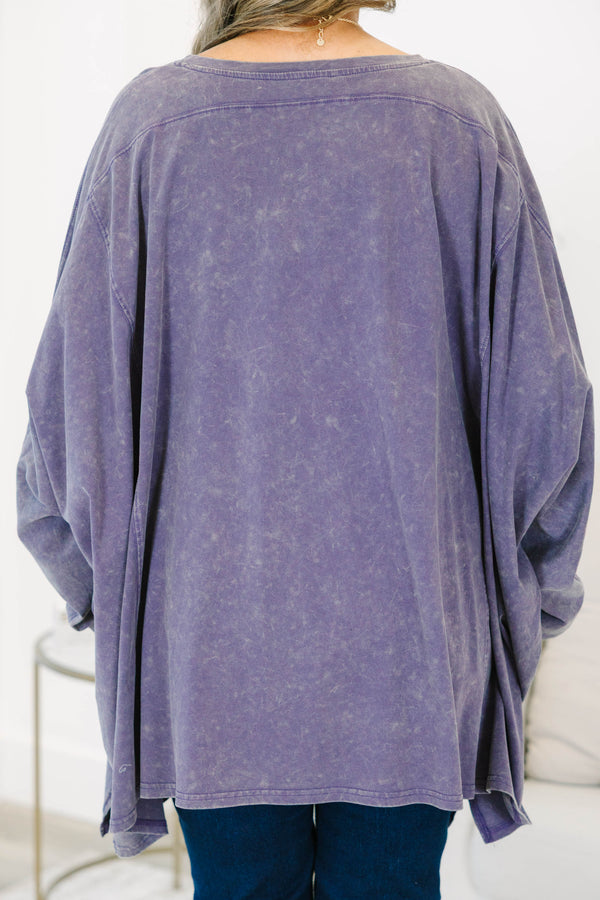 Plus Size plum mineral wash tunic with an oversized fit, long sleeves, and a round neckline.