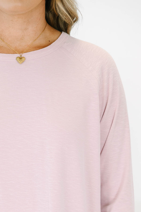 Plus size light mauve long sleeve top with a relaxed fit and soft, stretchy fabric.