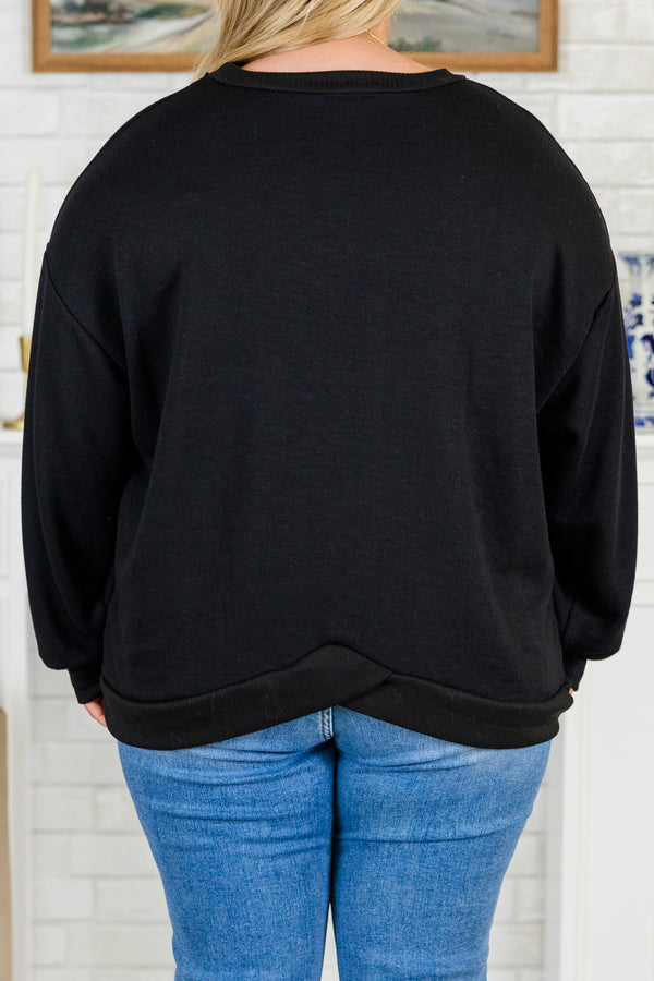 Plus Size black long sleeve top with drop shoulders, ribbed crew neck, cuffs, and banded hem.