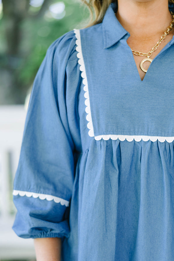 Plus size chambray top with white ric-rac trim, flowy babydoll fit, and 3/4 puff sleeves.
