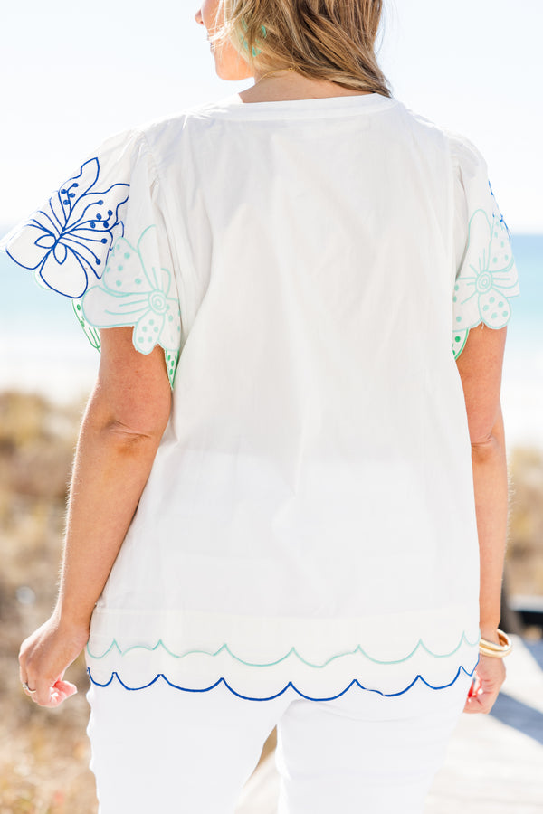 Chic Soul plus size clothing, short-sleeve off white-blue top with a split-v-neckline and light blue and dark blue scalloped hem embroidering with a floral embroidering on the sleeve