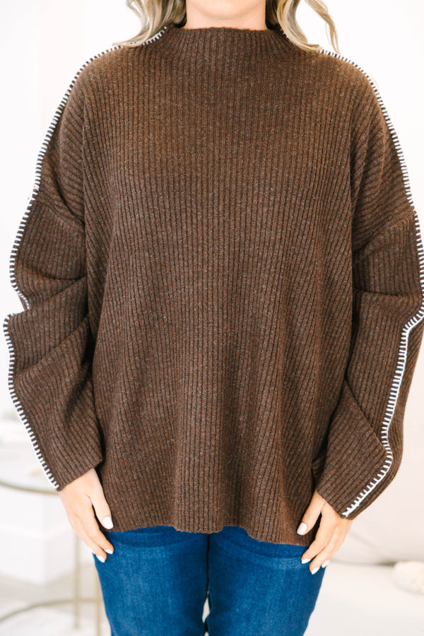 Plus Size brown ribbed knit sweater with a high neckline and white whipstitch trim on the sleeves.