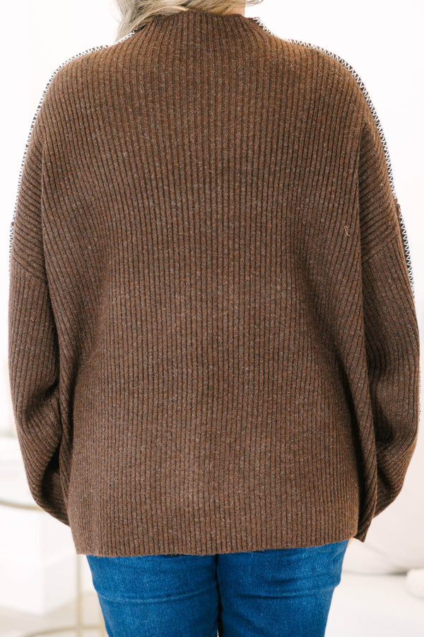 Plus Size brown ribbed knit sweater with a high neckline and white whipstitch trim on the sleeves.