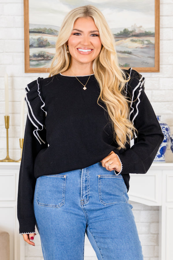 Chic Soul plus size clothing, black long sleeve knit sweater with round neckline and ruffle detail on shoulders with white outlining along ruffles, neckline, sleeves, and bottom
