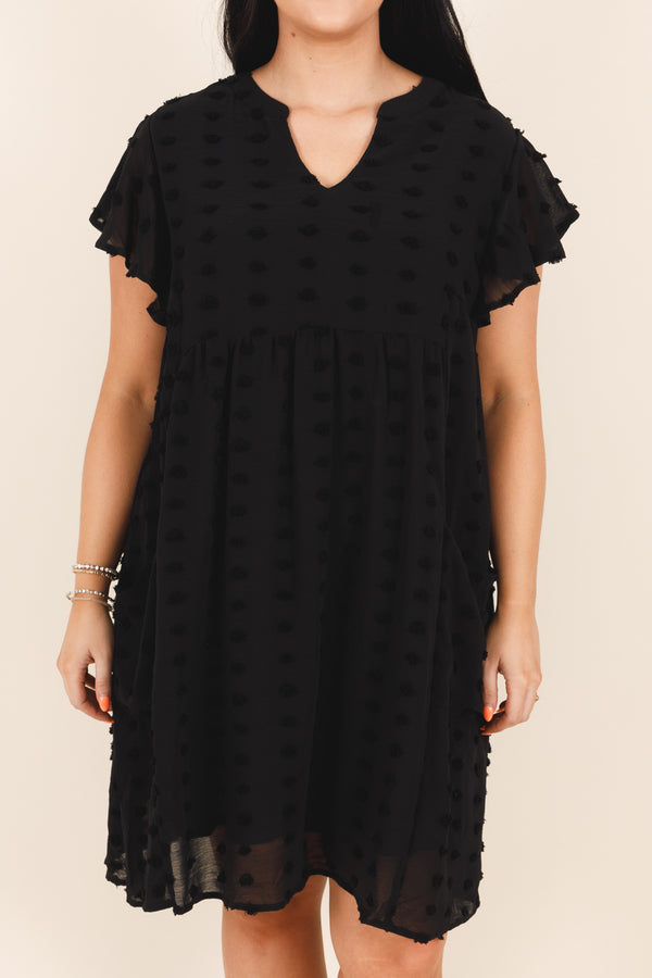Chic Soul plus size clothing, black flowy dress with an french raised dot pattern , v neckline, and ruffle sleeves