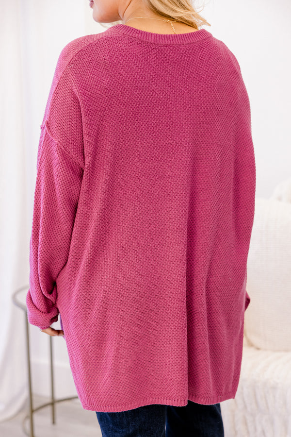 Plus Size pink henley sweater with a button-down neckline and long sleeves in a textured knit.