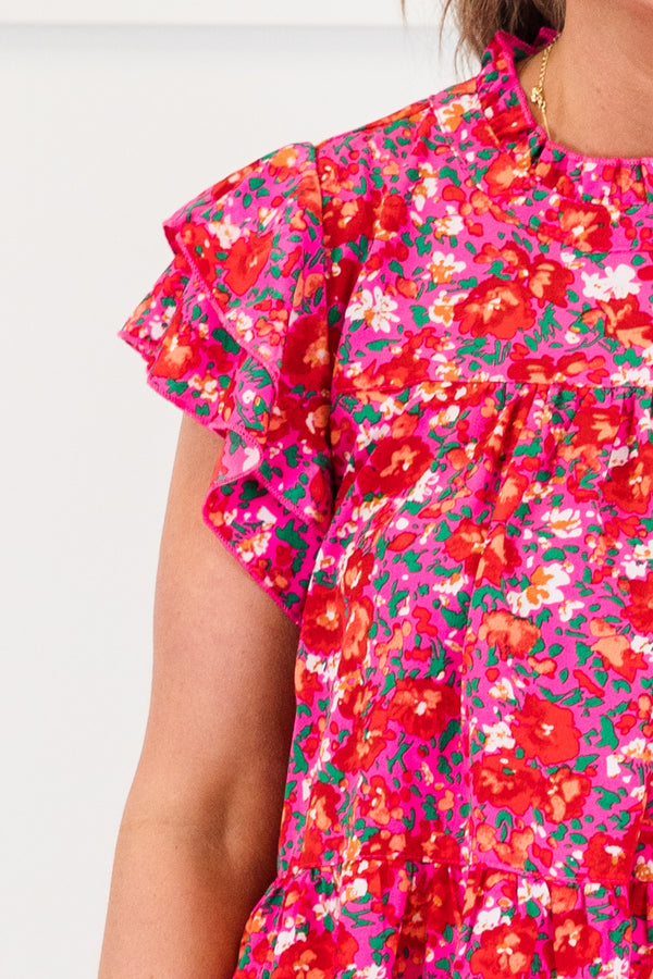 Chic Soul plus size clothing, pink short sleeve flowy top with tiered ruffle detailed sleeves with mock neckline with ruffle with multicolored floral print