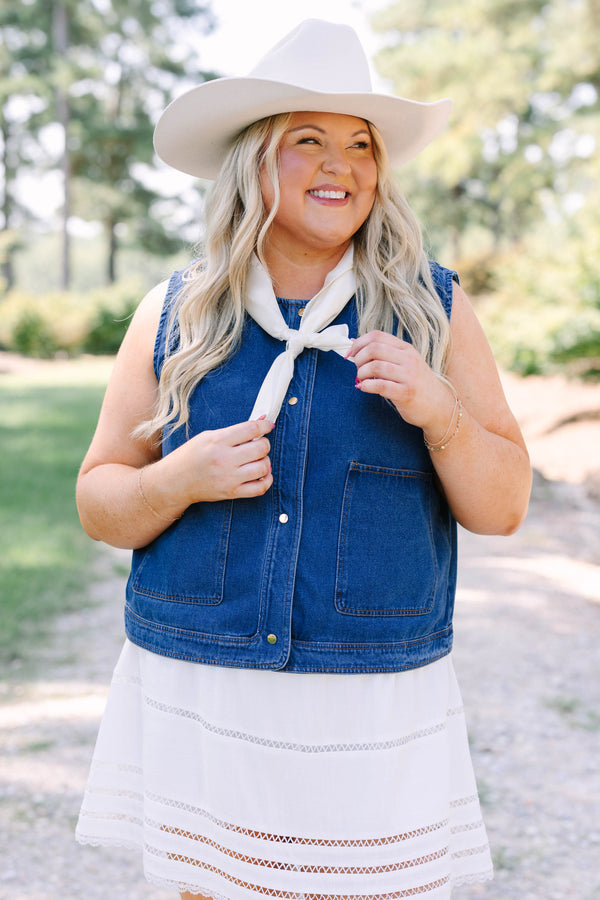 Plus Size dark denim vest with gold buttons, large front pockets, and a sleeveless design.