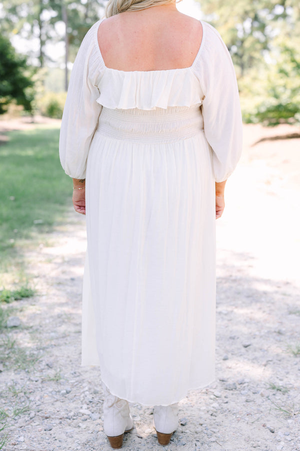 Plus Size cream midi dress with ruffle neckline, tiered bodice, and flowy three-quarter sleeves.