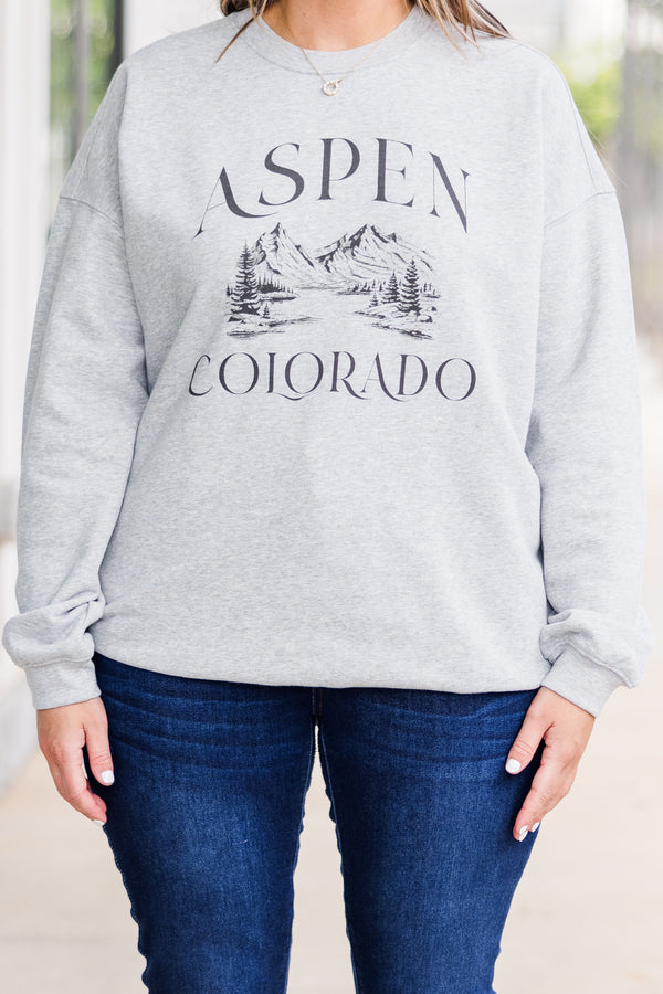 Chic Soul plus size clothing, long-sleeve heather grey crewneck pullover with graphic of mountain scene stating 