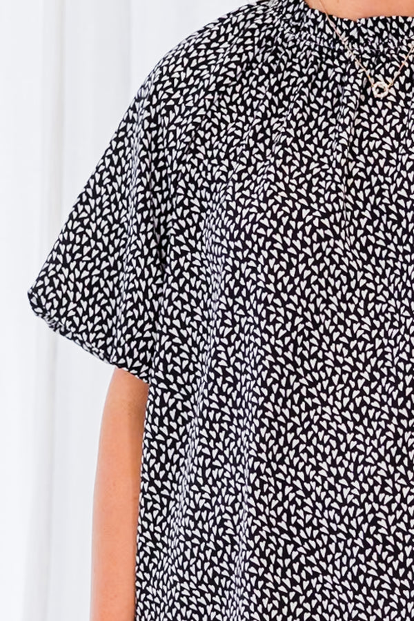 Chic Soul plus size clothing, black short sleeve top with white pattern with puff sleeves