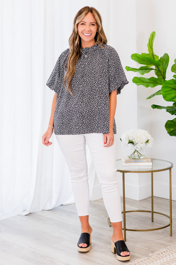Chic Soul plus size clothing, black short sleeve top with white pattern with puff sleeves