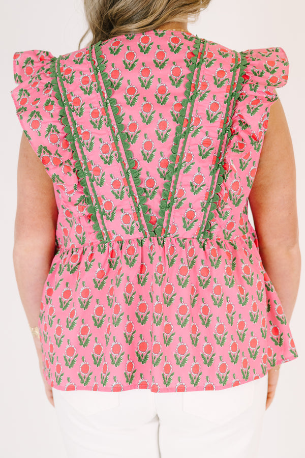 Chic Soul plus size clothing, pink top with flutter sleeves and a pink and green floral pattern as well as green scalloped detailing going along the v-neckline and the sides of the neckline 