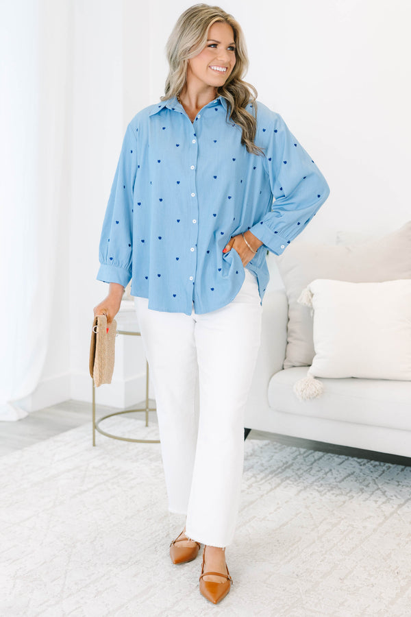 Plus Size light wash denim button-down shirt with dark blue heart embroidery and long sleeves.