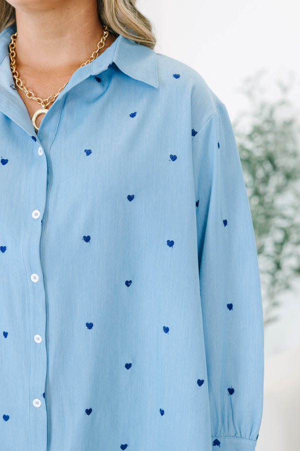 Plus Size light wash denim button-down shirt with dark blue heart embroidery and long sleeves.
