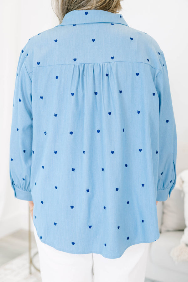 Plus Size light wash denim button-down shirt with dark blue heart embroidery and long sleeves.