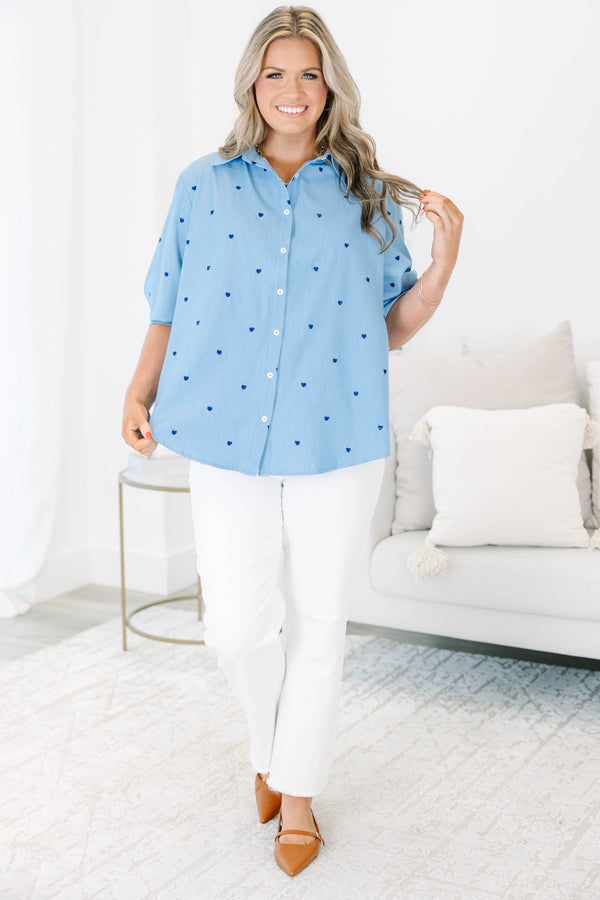 Plus Size light wash denim button-down shirt with dark blue heart embroidery and long sleeves.