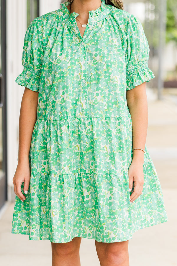 Chic Soul plus size clothing, puffed short sleeve green ruffled baby doll dress with smocked v-neckline and floral green and yellow pattern 