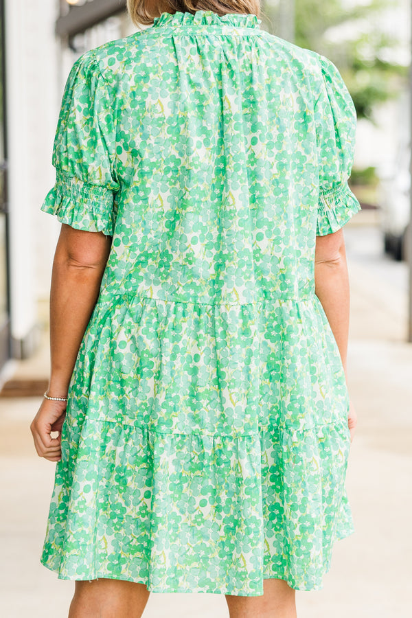 Chic Soul plus size clothing, puffed short sleeve green ruffled baby doll dress with smocked v-neckline and floral green and yellow pattern 