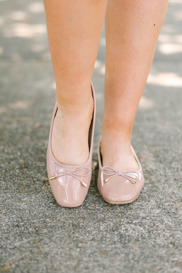Plus Size blush patent leather ballet flats with a round toe and a delicate bow detail.