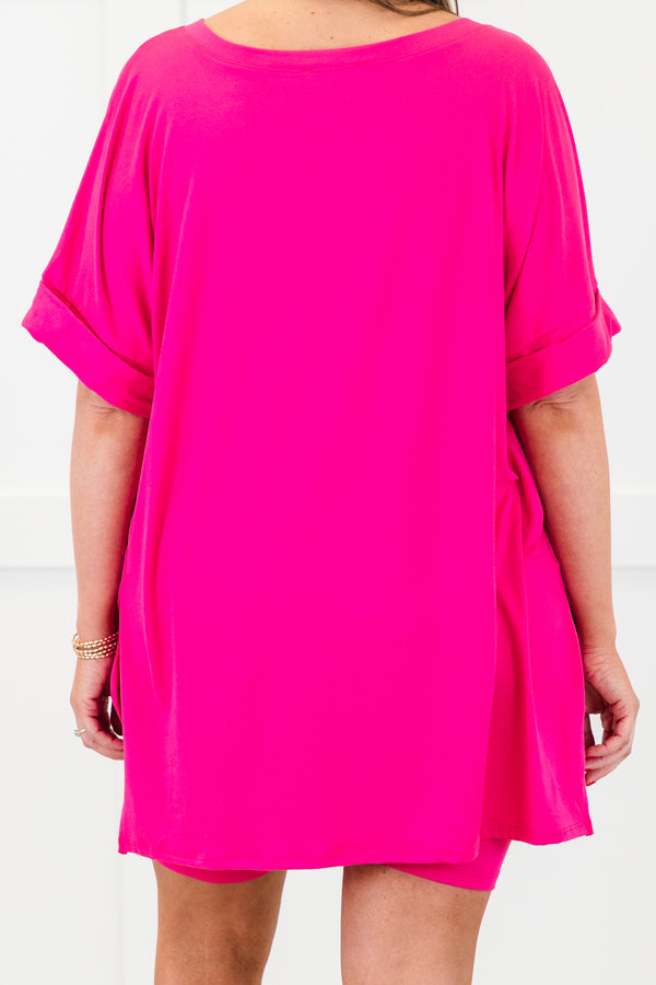 Plus Size neon hot pink set with a v-neck short sleeve tunic top and matching biker shorts.