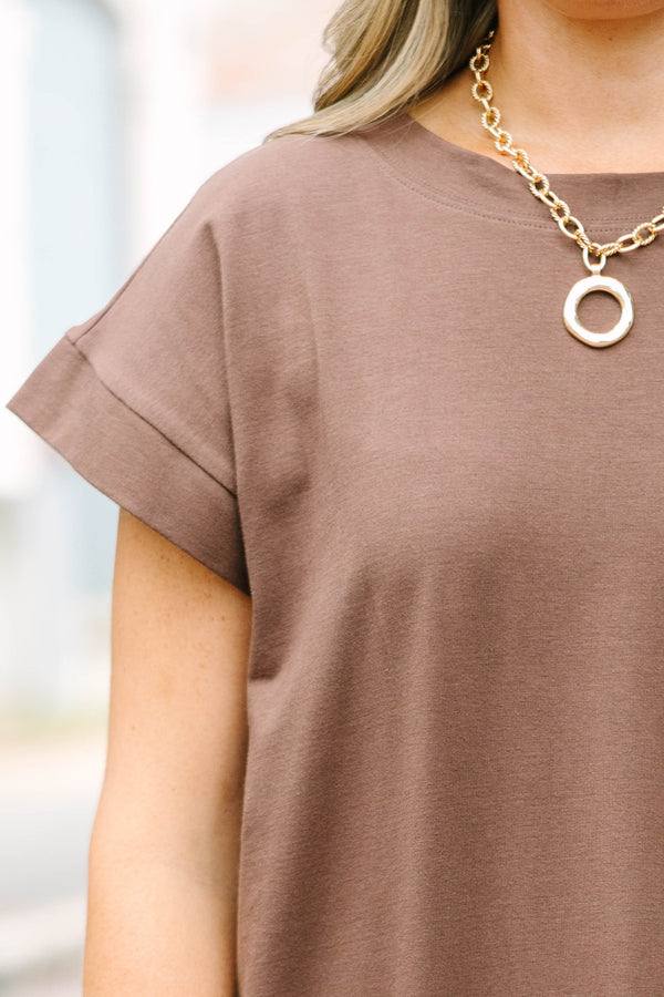 Plus Size brown short-sleeve t-shirt dress with a crew neckline and side slits.
